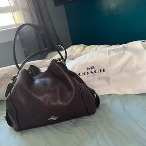Coach burgundy hand bag!! Great condition bought it from macys!